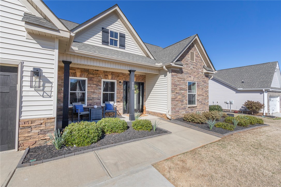 203 Graceview West Anderson, SC 29625 - Photo 2 of 50 This charming home showcases a welcoming front porch, tasteful landscaping, and durable siding.