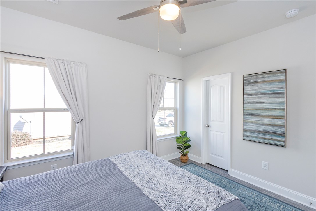 203 Graceview West Anderson, SC 29625 - Photo 20 of 50 Bright and airy, this comfortable bedroom provides a serene retreat for rest and relaxation.