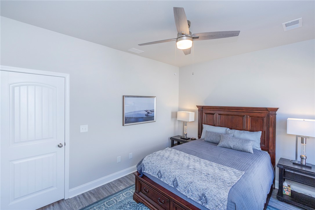 203 Graceview West Anderson, SC 29625 - Photo 21 of 50 This serene bedroom offers comfortable living with elegant finishes and a relaxing ambiance.