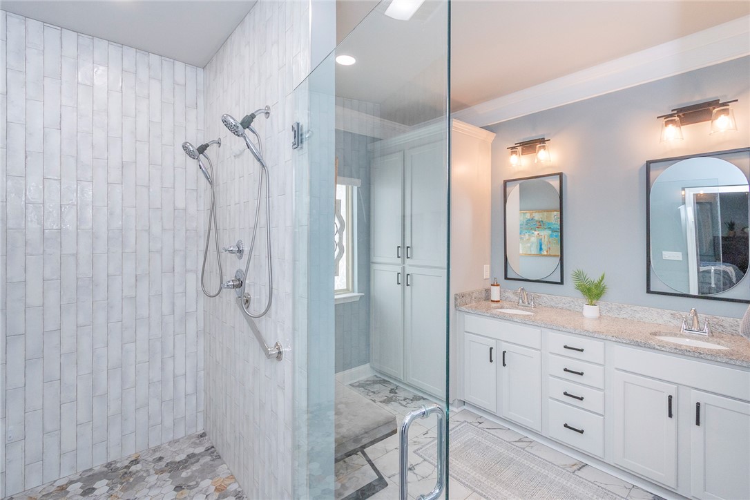 203 Graceview West Anderson, SC 29625 - Photo 25 of 50 This modern bathroom features a spacious shower and a dual vanity with ample storage.