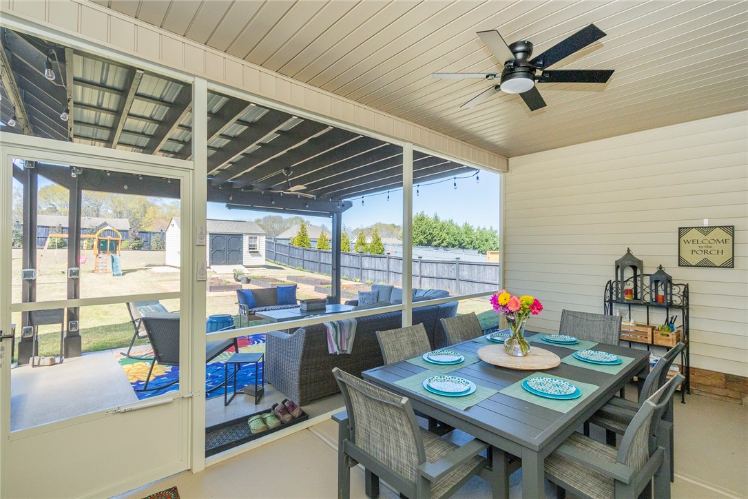 203 Graceview West Anderson, SC 29625 - Photo 30 of 50 Enjoy outdoor gatherings on this covered porch, perfect for entertaining and relaxation.