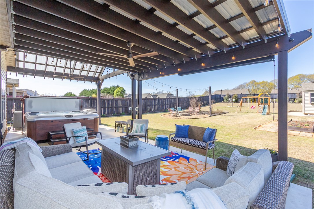 203 Graceview West Anderson, SC 29625 - Photo 37 of 50 Enjoy the expansive covered patio and hot tub in this private outdoor oasis.