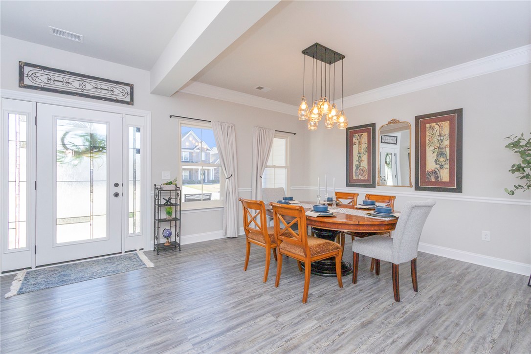 203 Graceview West Anderson, SC 29625 - Photo 4 of 50 This bright dining area features ample natural light, creating an inviting space for meals.