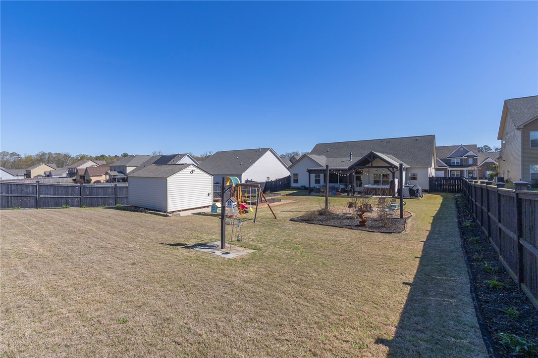 203 Graceview West Anderson, SC 29625 - Photo 42 of 50 This spacious backyard offers privacy and endless outdoor enjoyment.