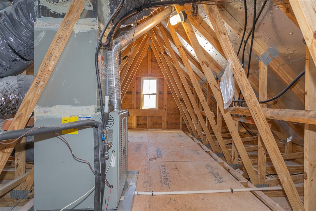 203 Graceview West Anderson, SC 29625 - Photo 47 of 50 This attic space provides ample storage with a window for natural light.