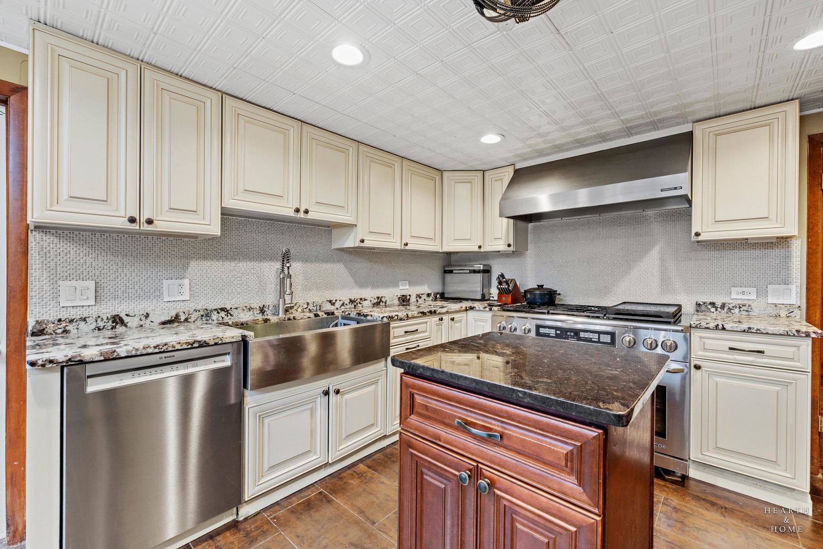 99 Lee Road Northbrook, IL 60062 - Photo 20 of 57 a kitchen with a stove sink and cabinets
