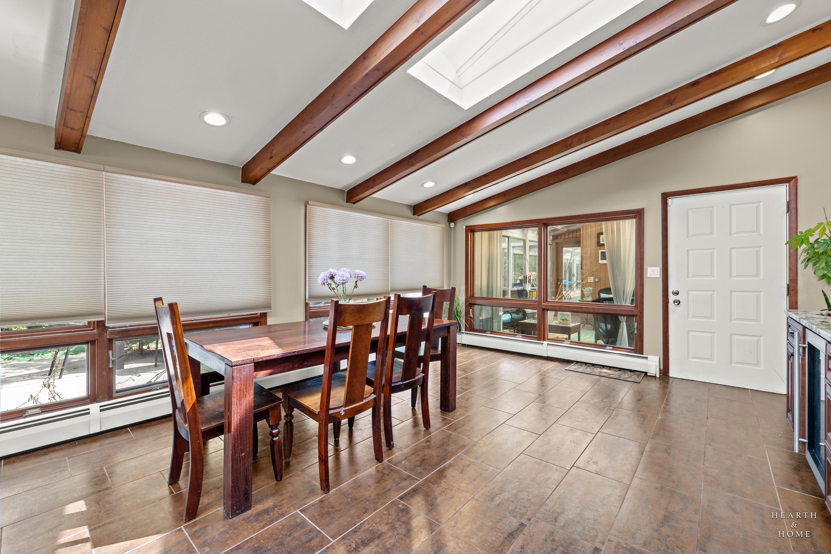 99 Lee Road Northbrook, IL 60062 - Photo 24 of 57 a view of a dining room with furniture and wooden floor