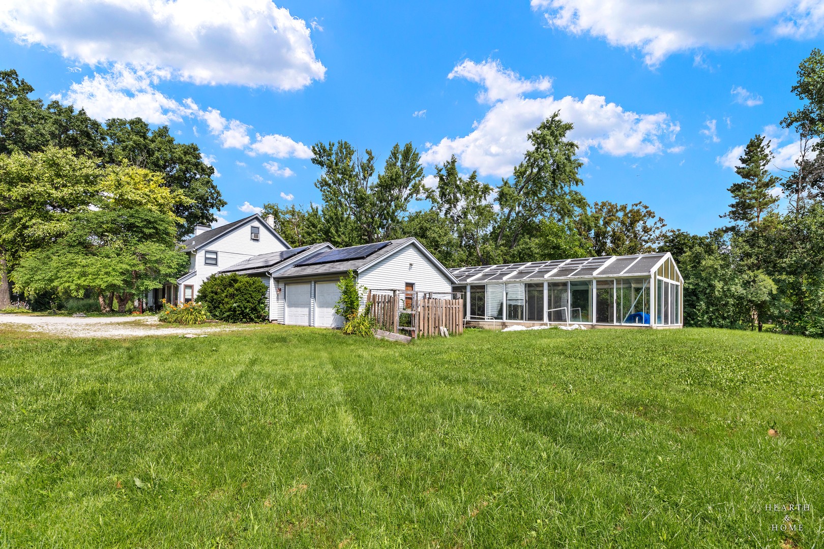 99 Lee Road Northbrook, IL 60062 - Photo 4 of 57 a front view of a house with a garden