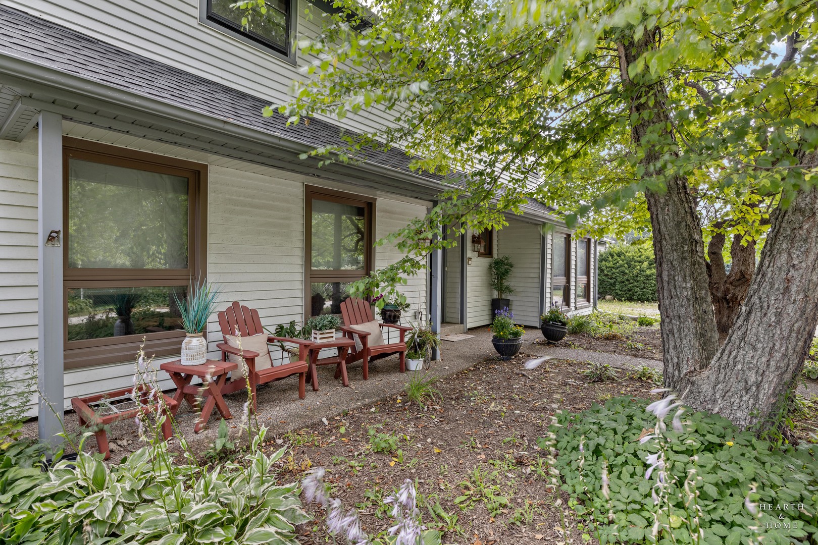 99 Lee Road Northbrook, IL 60062 - Photo 48 of 57 a view of a house with backyard sitting area and garden