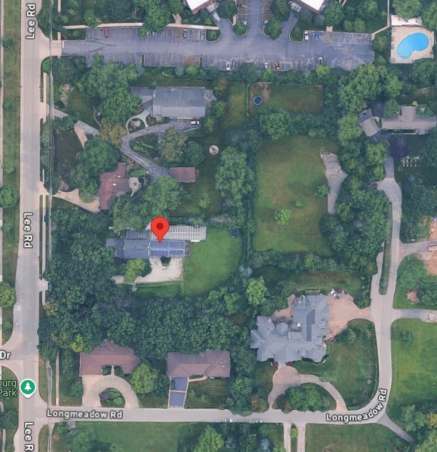 99 Lee Road Northbrook, IL 60062 - Photo 50 of 57 an aerial view of a house with a yard and lake view