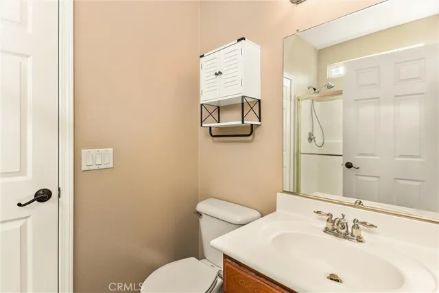 a kitchen with stainless steel appliances granite countertop wooden cabinets a sink and dishwasher