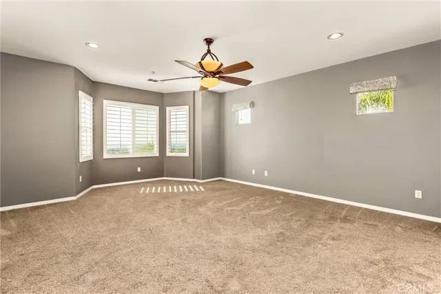 a view of swimming pool with outdoor seating