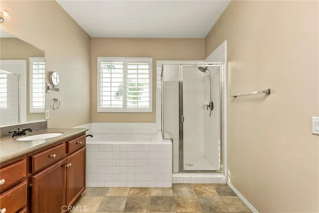 an aerial view of a house with a garden and plants