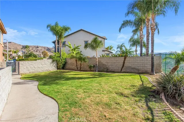 a view of a city with mountains in the background
