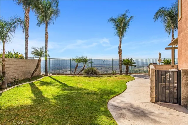 an aerial view of residential houses and outdoor space