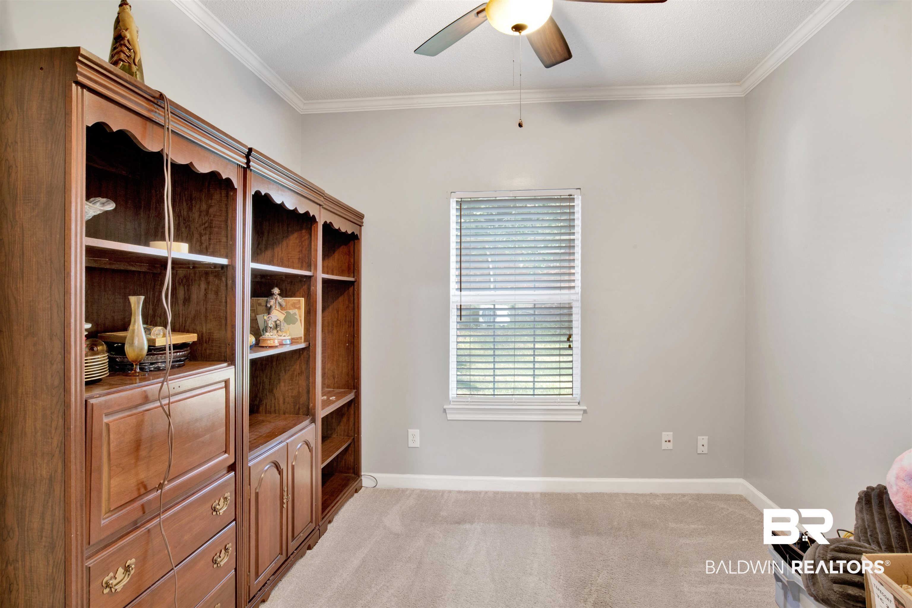 445 Wedgefield Drive South Mobile, AL 36608 - Photo 17 of 36 Interior space featuring ceiling fan and ornamental molding