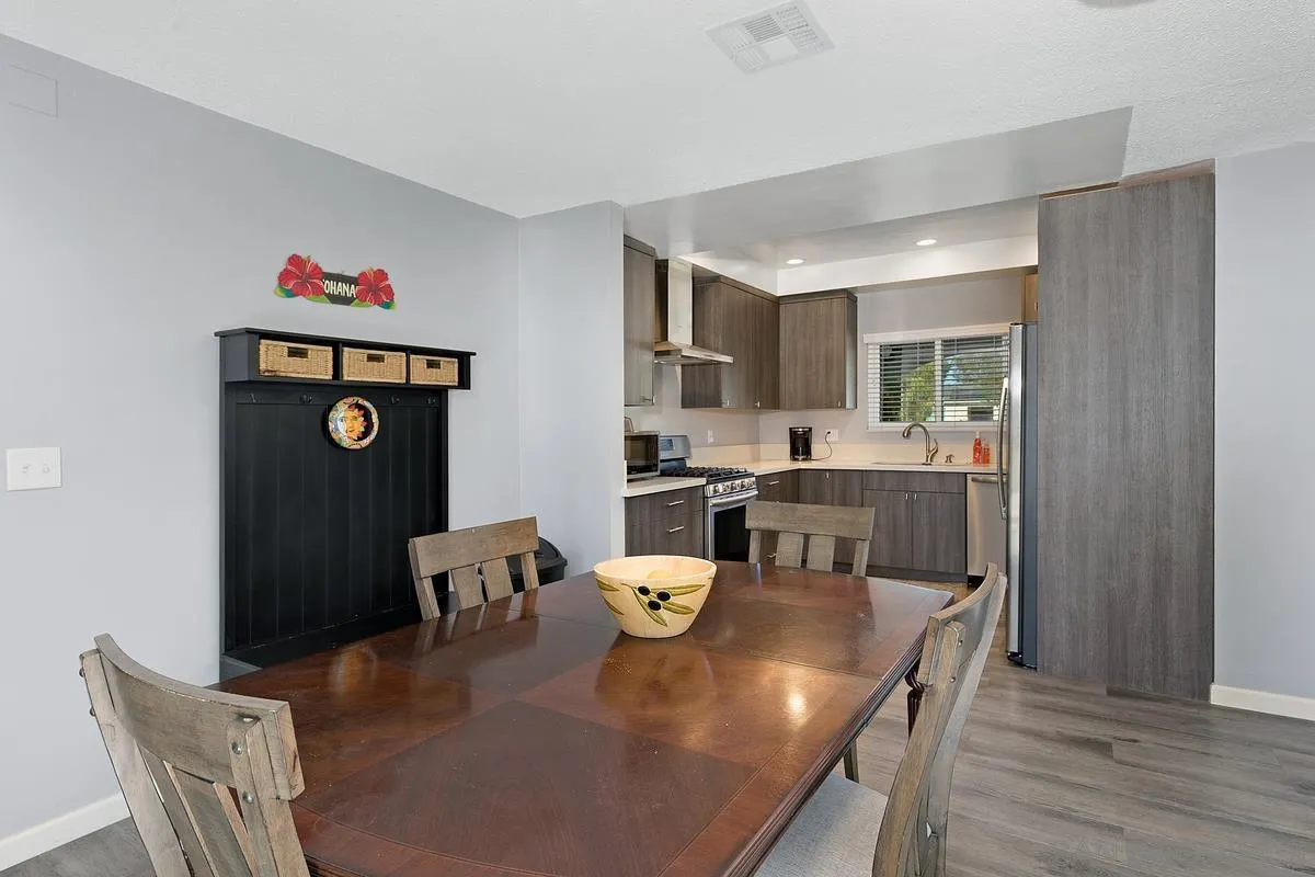 24567 Adams Avenue Murrieta, CA 92562 - Photo 13 of 42 a dining room with furniture and window