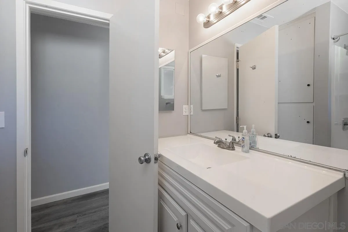 24567 Adams Avenue Murrieta, CA 92562 - Photo 20 of 42 a bathroom with a sink and a mirror