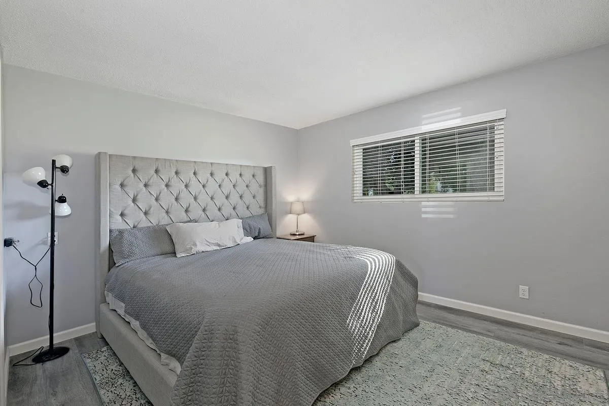 24567 Adams Avenue Murrieta, CA 92562 - Photo 23 of 42 a bedroom with a bed and a window