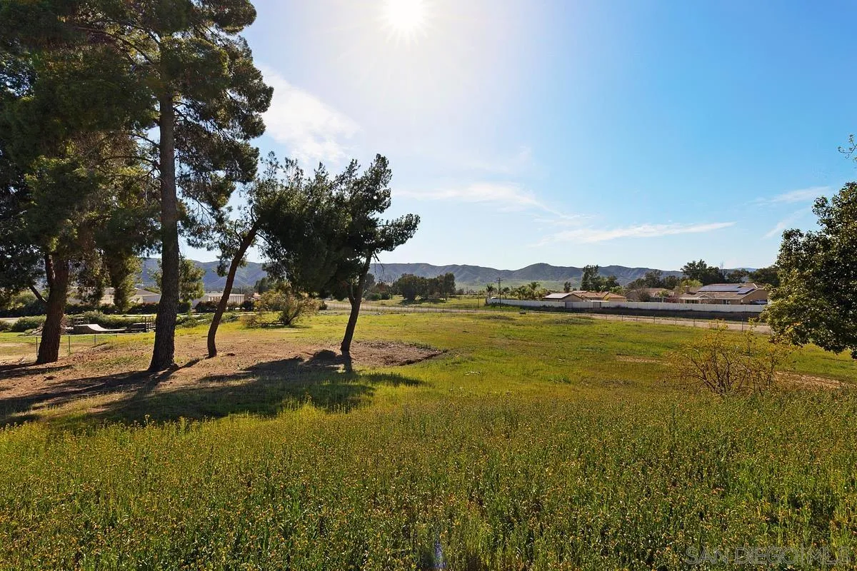 24567 Adams Avenue Murrieta, CA 92562 - Photo 31 of 42 a view of a lake with houses