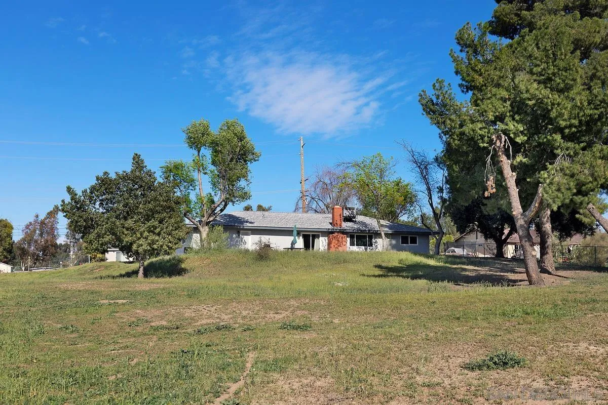 24567 Adams Avenue Murrieta, CA 92562 - Photo 39 of 42 a backyard of a house with table and chairs