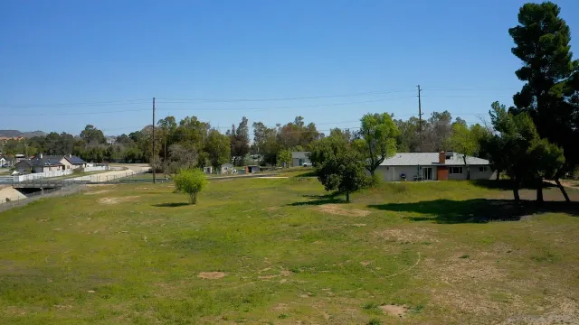 a view of swimming pool with a yard