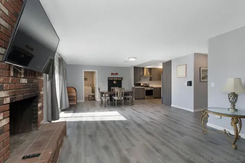 a view of a livingroom with furniture and a fireplace