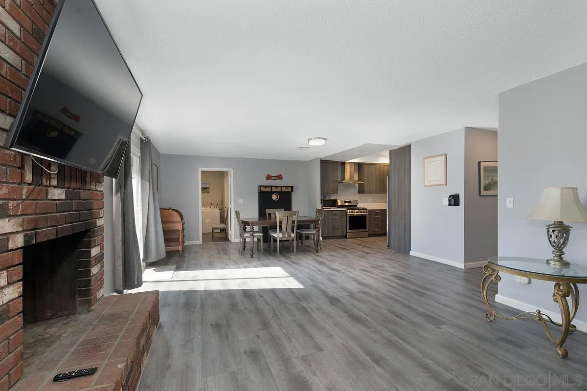 24567 Adams Avenue Murrieta, CA 92562 - Photo 10 of 42 a view of a livingroom with furniture and a fireplace