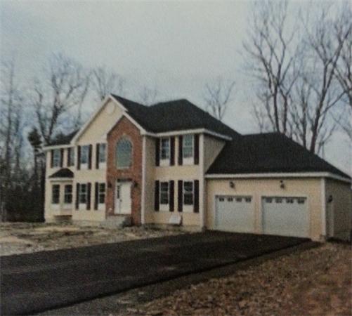 Lot631 Ryan Farm Road Windham, NH 03087 - Photo 1 of 1 a front view of a house with a yard