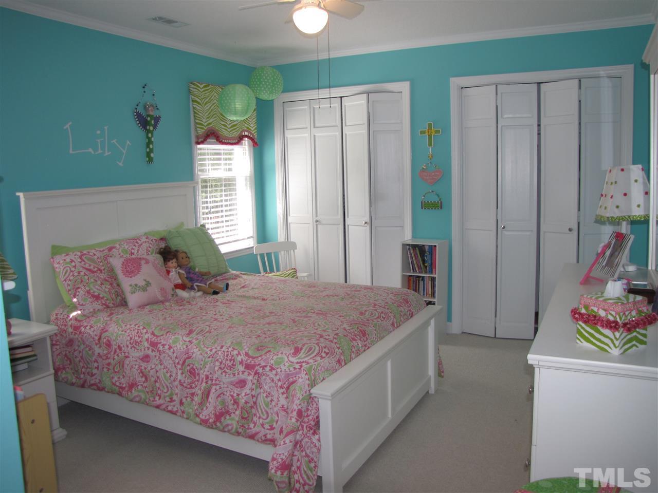 15800 Possum Track Road Raleigh, NC 27614 - Photo 12 of 25 a bedroom with a bed dresser and a window