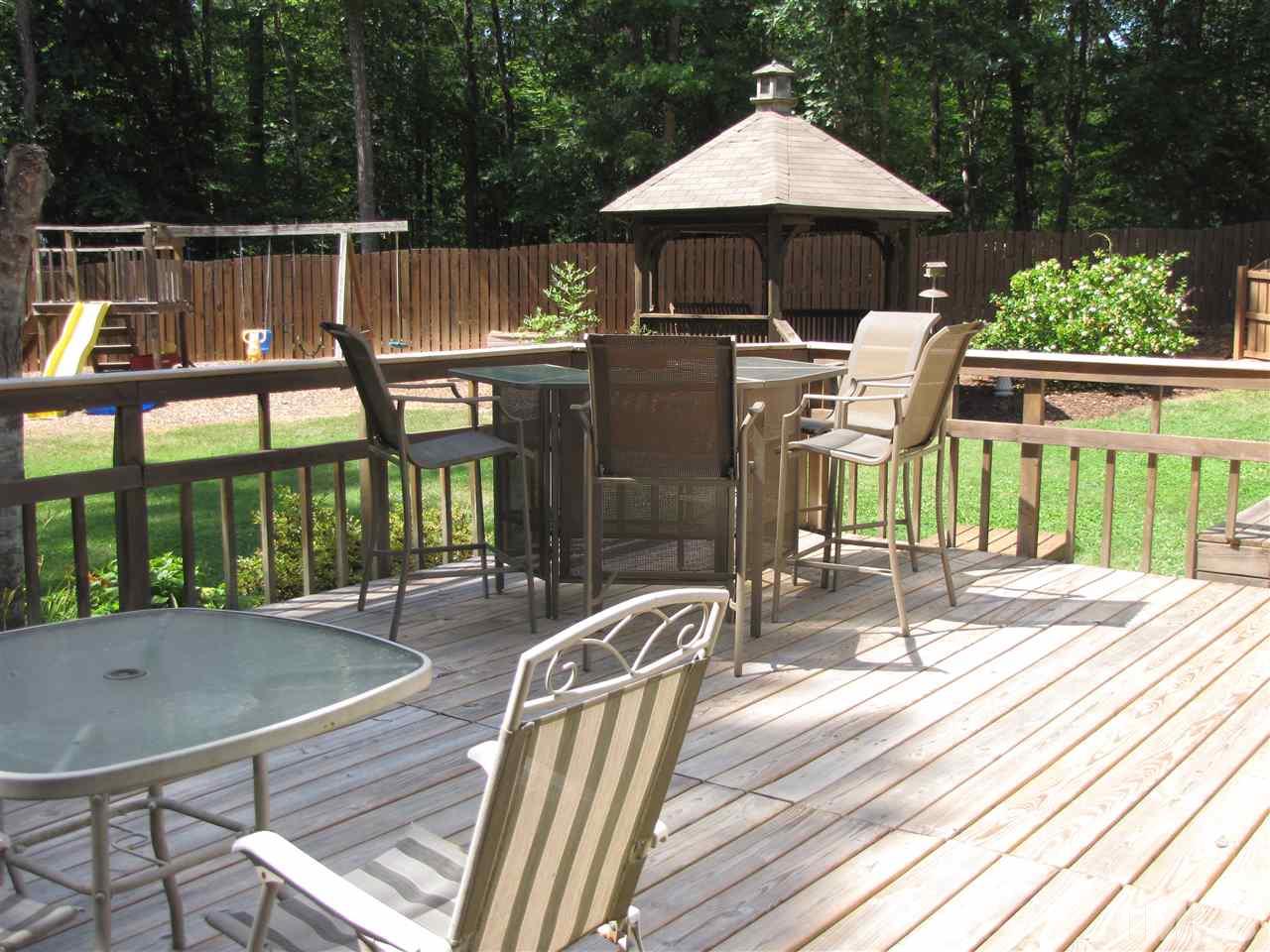 15800 Possum Track Road Raleigh, NC 27614 - Photo 3 of 25 a patio with table and chairs