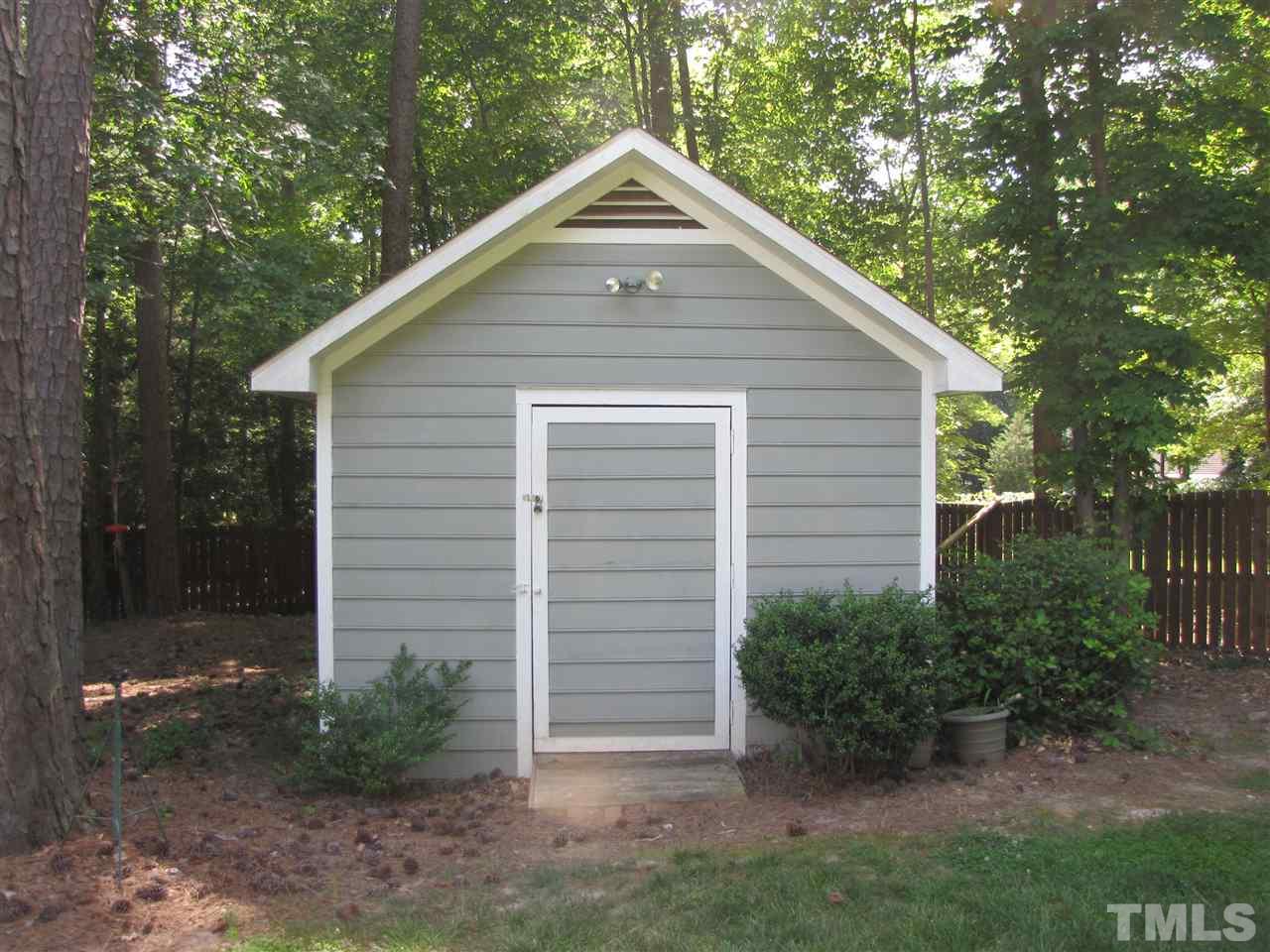 15800 Possum Track Road Raleigh, NC 27614 - Photo 4 of 25 a front view of a house with a yard