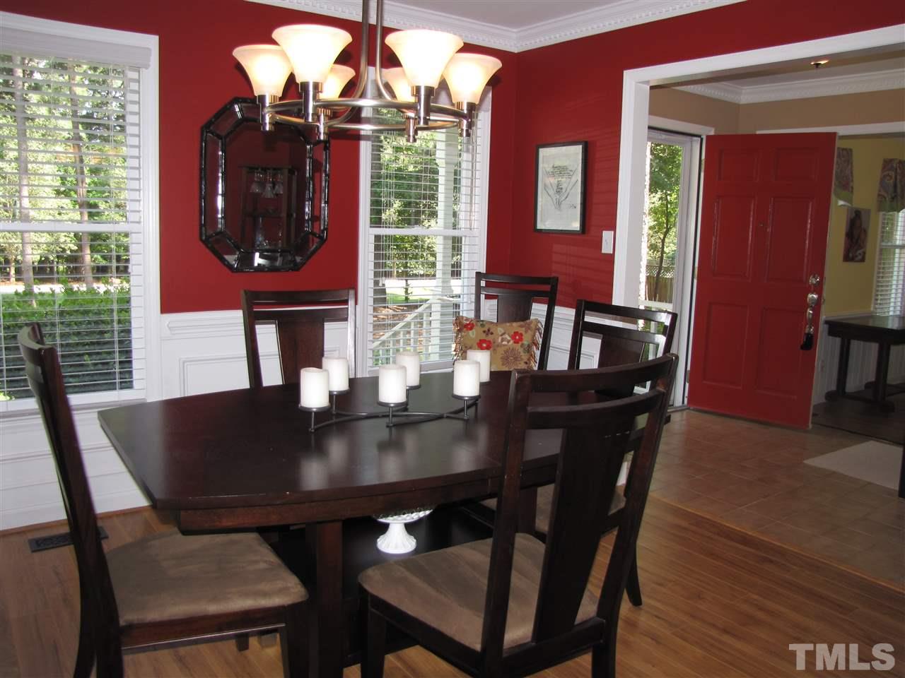 15800 Possum Track Road Raleigh, NC 27614 - Photo 5 of 25 a view of a dining room with furniture and chandelier