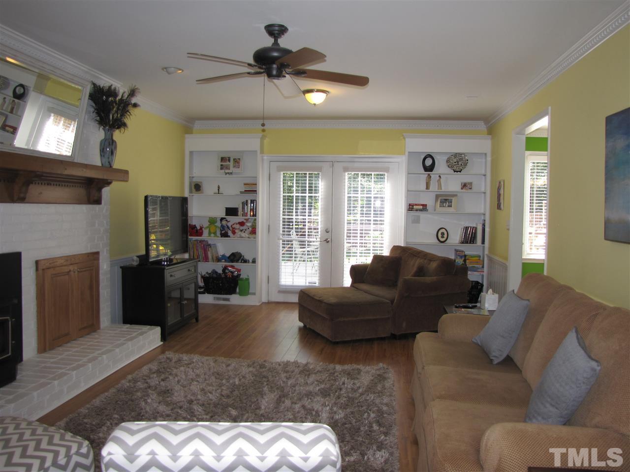 15800 Possum Track Road Raleigh, NC 27614 - Photo 7 of 25 a living room with furniture and a fireplace