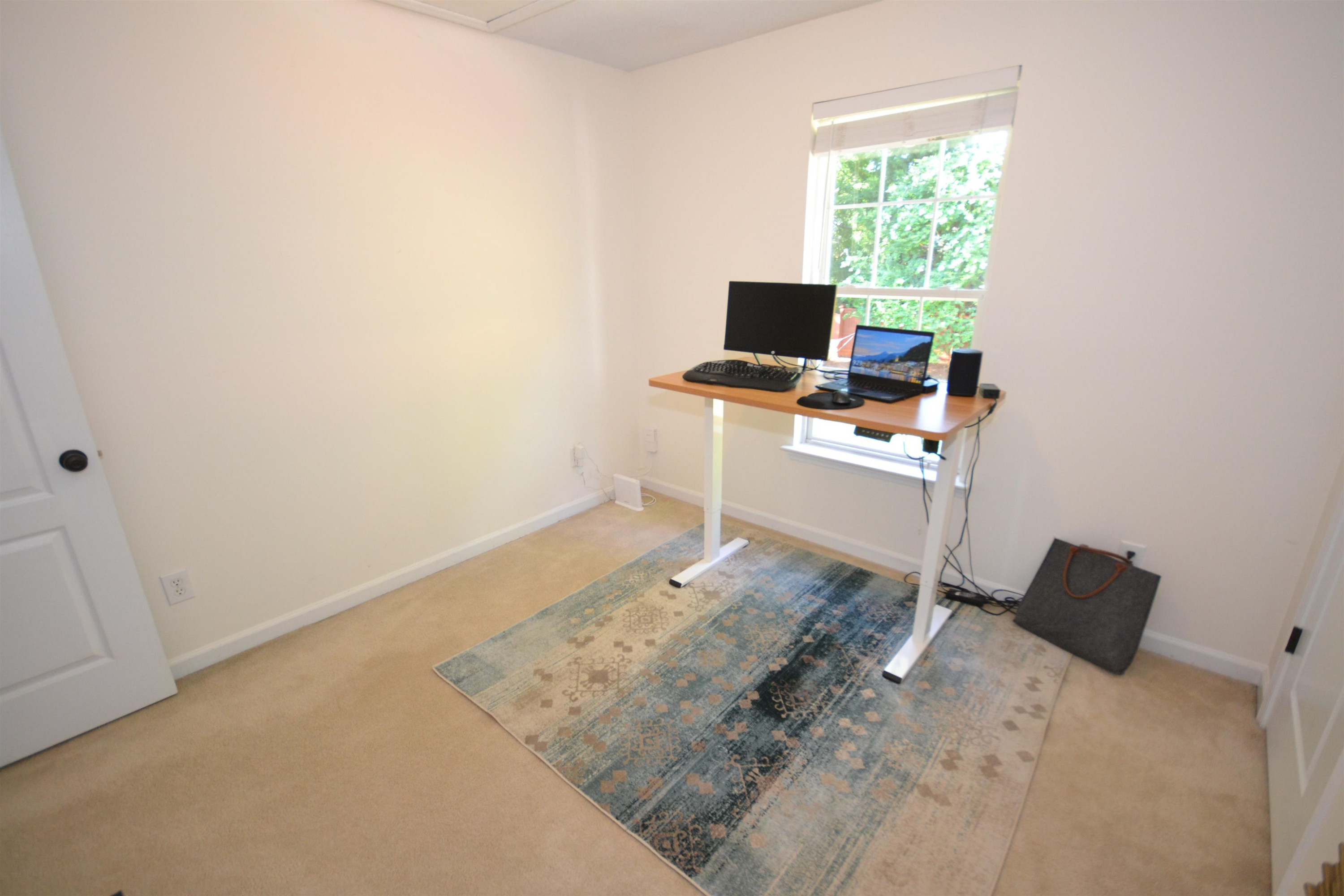 5501 Cardinal Grove Boulevard Raleigh, NC 27616 - Photo 19 of 37 a workspace with furniture and a window