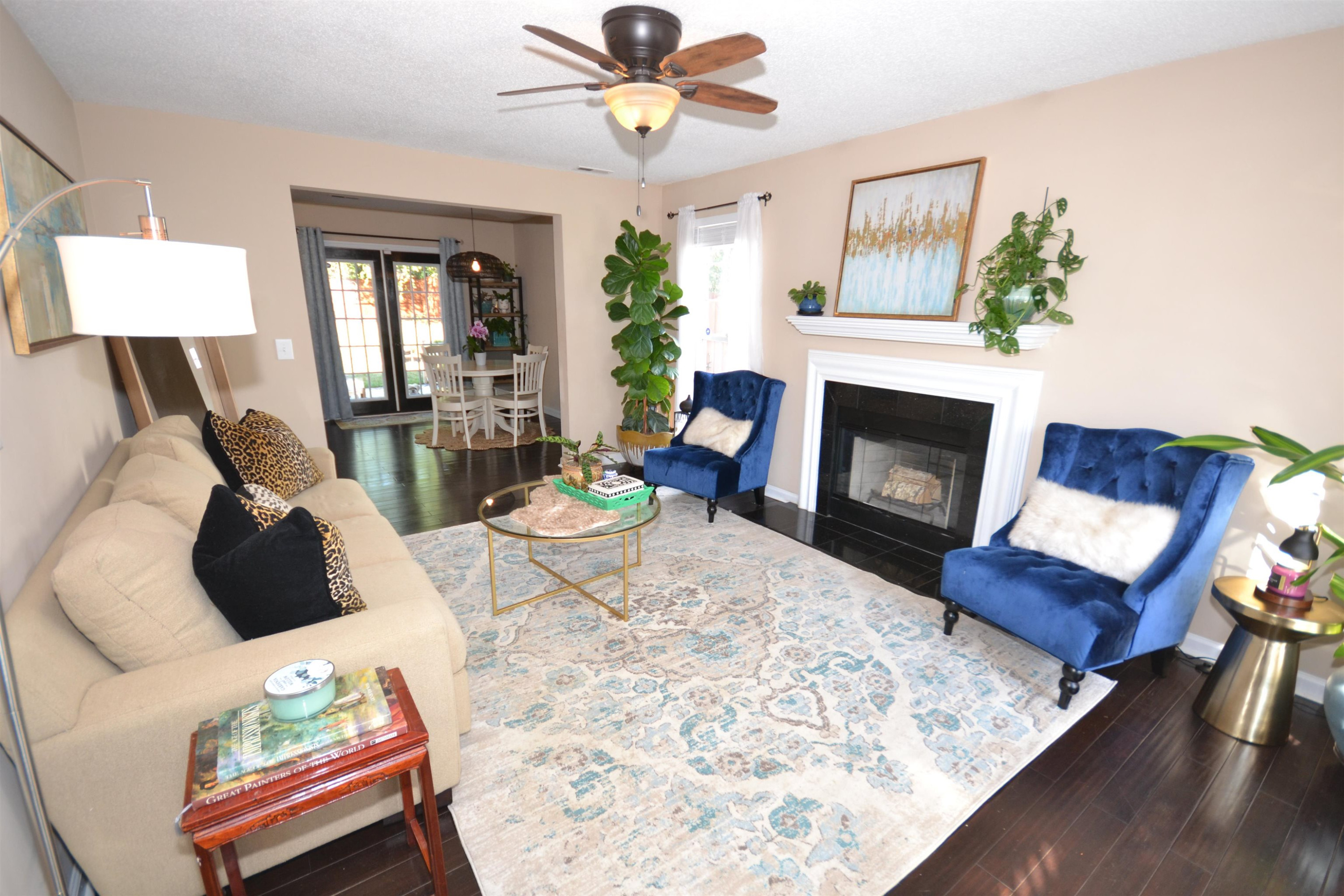 5501 Cardinal Grove Boulevard Raleigh, NC 27616 - Photo 2 of 37 a living room with furniture and a fireplace
