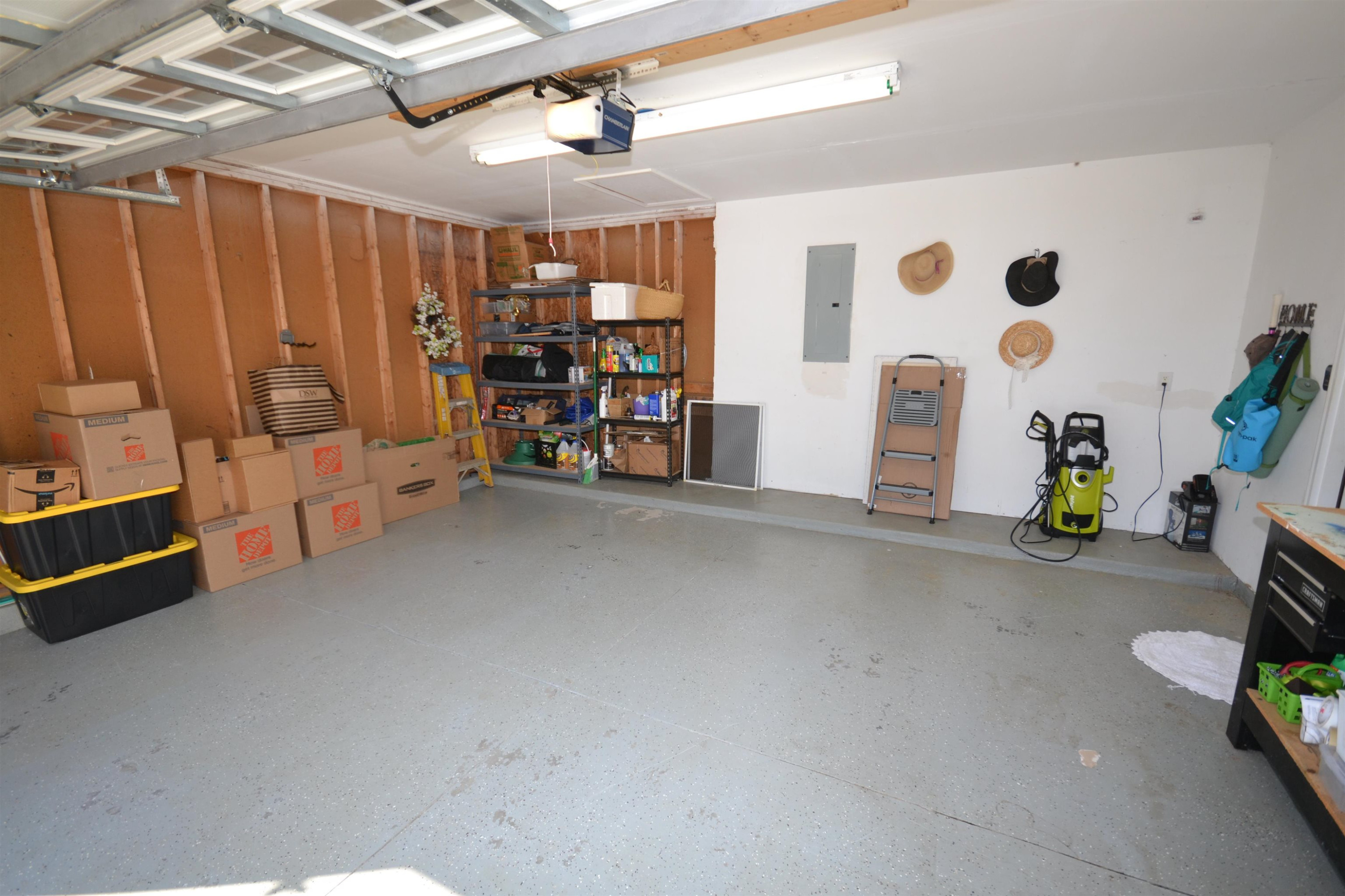 5501 Cardinal Grove Boulevard Raleigh, NC 27616 - Photo 30 of 37 a view of a livingroom with furniture and a garage