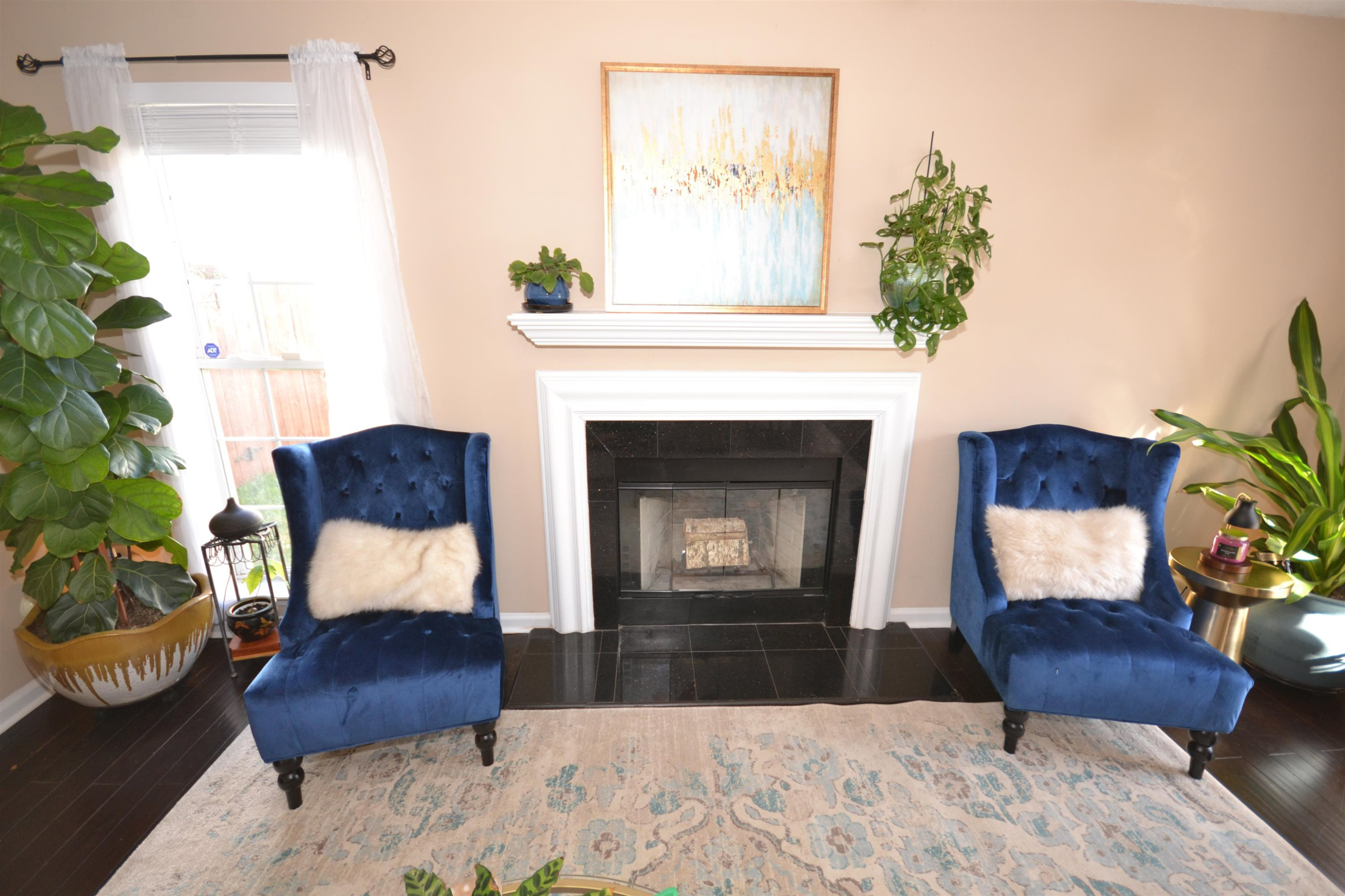 5501 Cardinal Grove Boulevard Raleigh, NC 27616 - Photo 4 of 37 a living room with furniture and a fireplace