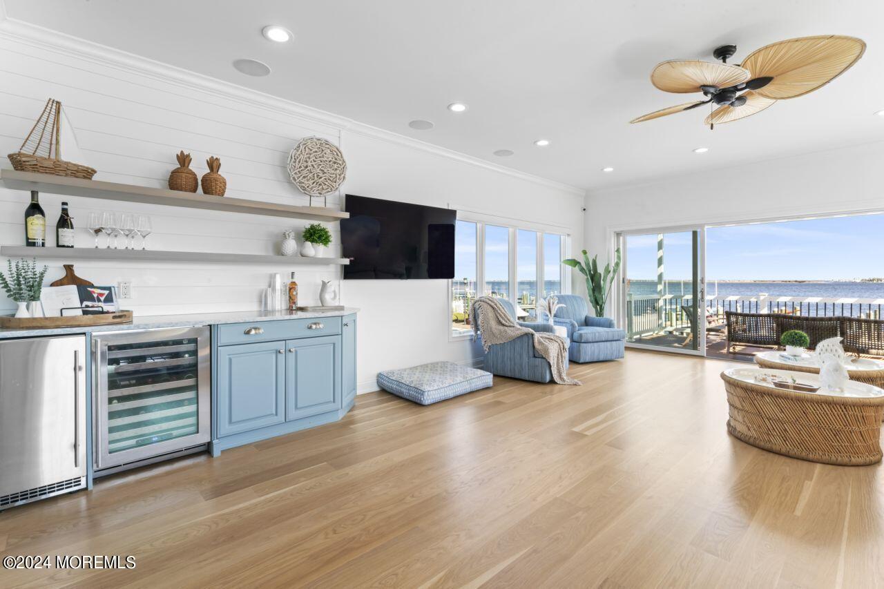1 Pershing Boulevard Lavallette, NJ 08735 - Photo 15 of 61 a living room with furniture and a flat screen tv