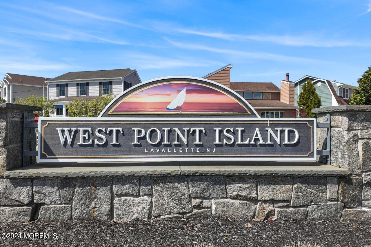 1 Pershing Boulevard Lavallette, NJ 08735 - Photo 2 of 61 a street sign that is on a pole