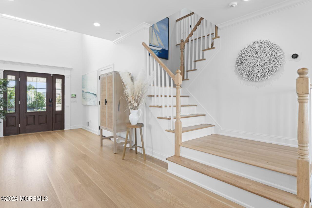 1 Pershing Boulevard Lavallette, NJ 08735 - Photo 21 of 61 a view of entryway and hall with wooden floor