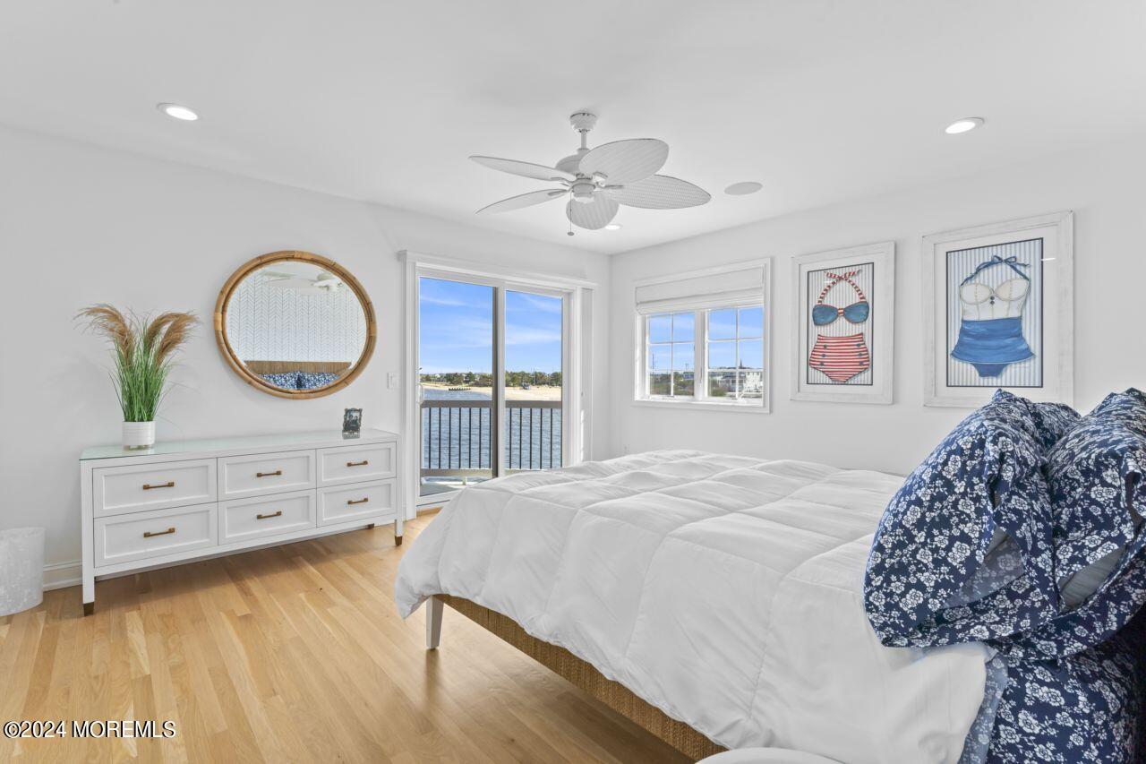 1 Pershing Boulevard Lavallette, NJ 08735 - Photo 29 of 61 a bedroom with a bed and a dresser
