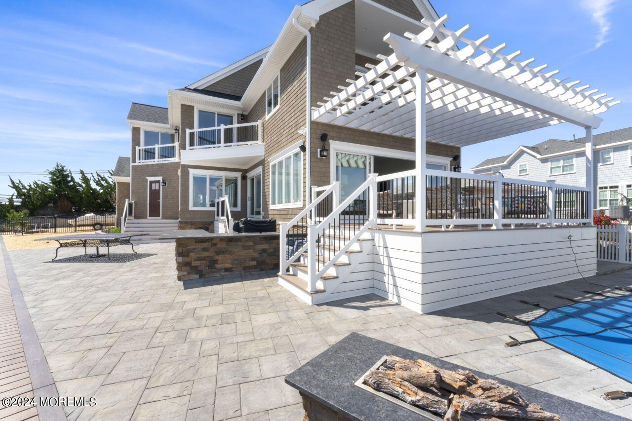 1 Pershing Boulevard Lavallette, NJ 08735 - Photo 46 of 61 a view of a building with sitting area