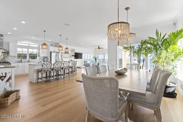 a view of a kitchen and dining room