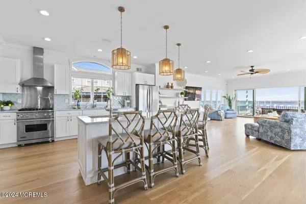 a view of a kitchen and dining room