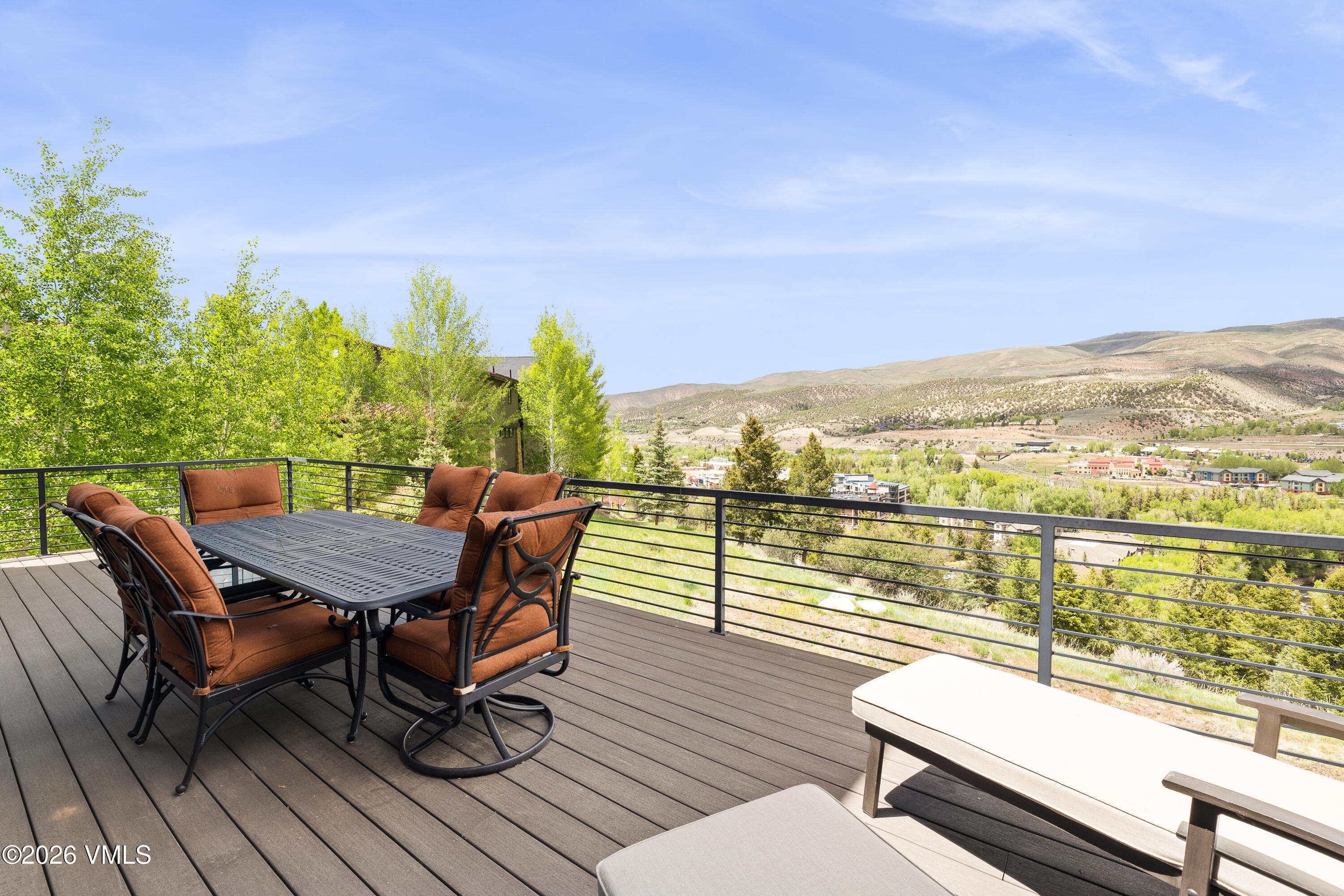 91 Edwards Pointe Edwards, CO 81632 - Photo 14 of 39 a view of a balcony with wooden floor and outdoor seating