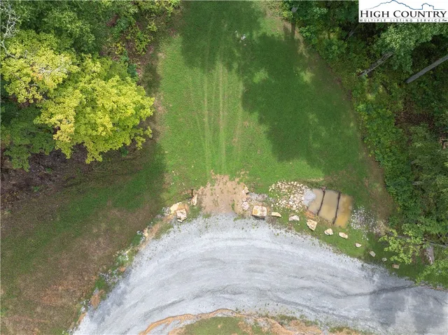 a view of a garden with an empty space