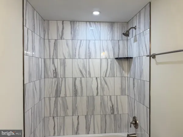 a view of a bathroom with shower