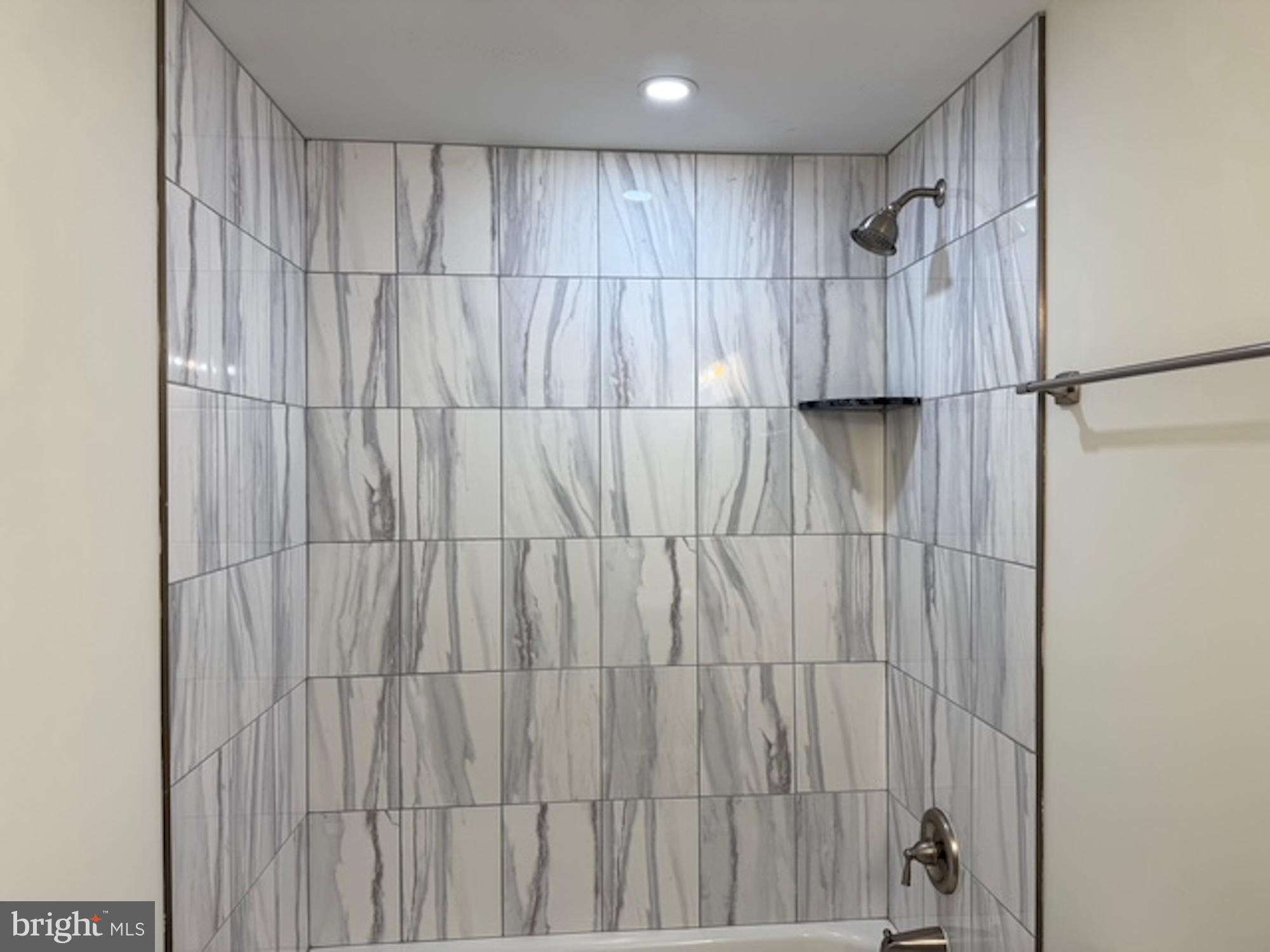 6409 63rd Place Riverdale, MD 20737 - Photo 17 of 22 a view of a bathroom with shower