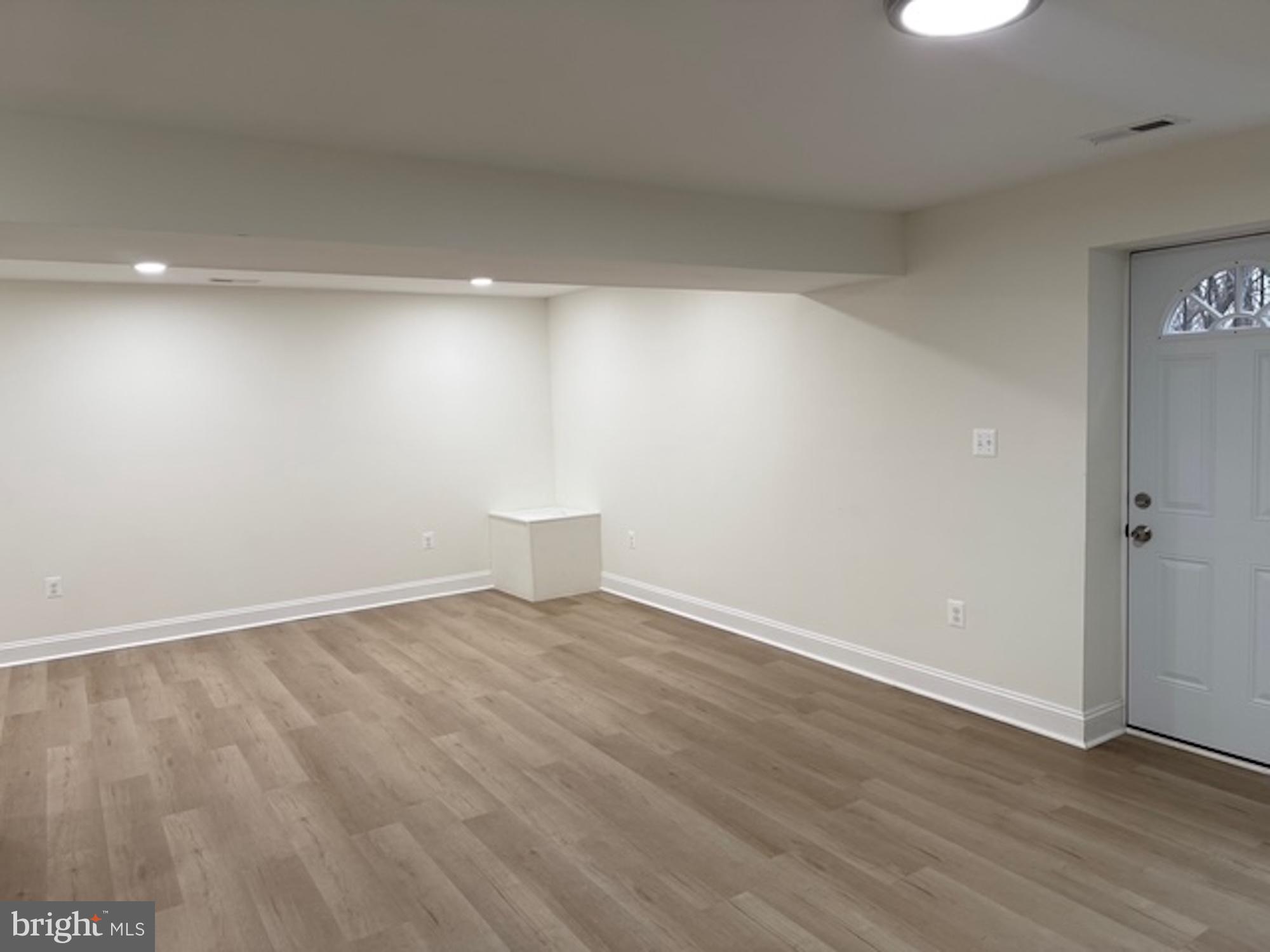 6409 63rd Place Riverdale, MD 20737 - Photo 6 of 22 a view of an empty room